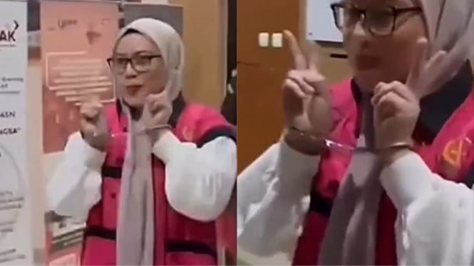 sosok-ariyuli-ningsih-lindoeno-tersangka-korupsi-yang-tebar-senyuman-dan-pose-dua-jari-saat-ditangkap_916bd5e.jpg